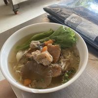 Yellow noodle soup   at Ahaa Boer Vegetarian Food in Battambang