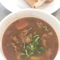 Seet veggie beef mushroom soup with bread at Ahaa Boer Vegetarian Food in Battambang