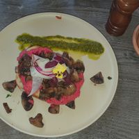 Mushrooms and hommus on soughdough at Suburban West End in South Brisbane