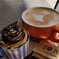 Vegan cupcake and latte at Suburban West End in South Brisbane