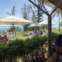 Setting with outdoor tables  at The Foreshore in Nightcliff