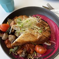 Hippie bowl with house beans, roast zucchini, betrothed hummus and sourdough  at The Foreshore in Nightcliff