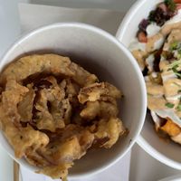 Onion rings, straws cup at Big Mood in Buffalo