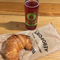 Vegan apricot croissant with organic kombucha at GVA - Bistrot Geneve - T1 in Geneva
