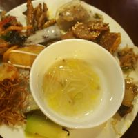 Mixed soup, fried mushrooms, spring rolls, fruit rolls, fried banana flower, traditional sticky rice cake etc at Huong Thien Buffet Chay in Hanoi