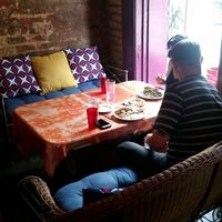 Fun seats in the window. at Bennachin in New Orleans