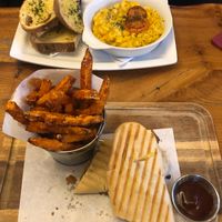 Sweet chilli seitan panini & sweet potato fries / “macca cheese” & garlic bread at Brooklyn Cafe in Glasgow
