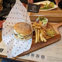 A sweet and sour original burger made with tempeh, dates, and banana chips. at Premarché Alternative Diner in Kyoto