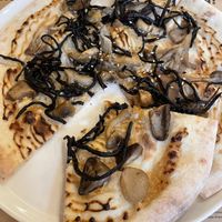 Vegan mushroom hijiki pizza  at Premarché Alternative Diner in Kyoto