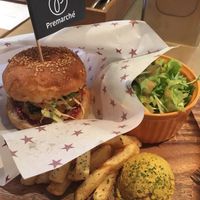 Burger set with salad, fries, and curry hummus. at Premarché Alternative Diner in Kyoto