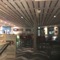 Seating area near to the bar at Huck's in Brandon