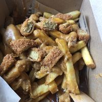 Motherclucker  cheesy fries with chicken nugget bits  at Le Pub in Newport