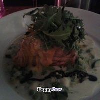 A Puff pastry pillow filled with Haloumi, garden peas and broccoli bound in a white wine veloute at The King William IV in Royston