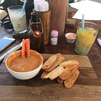 Hummus with a lot of added house spice & cocktails  at La Buguita in Bocas Del Toro