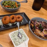 Spicy beans, ulundu vada, eggplant moju, green chilli and coconut sambal at Spice Garden in Nightcliff