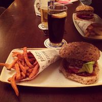 Vegan burger with sweet potato fries at Kennedy's in Munich