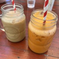 Oat milk coffee frappe and cleanser juice; we already drank some;)  at The Bean Tree Cafe in Alice Springs
