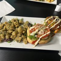 The RVE burger with a side of fried okra  at The Reizod Vegan Experience in Columbia