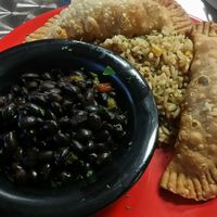 Empanadas with rice and beans at The Reizod Vegan Experience in Columbia