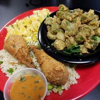 Fried "Chiken Drumstiks" on a bed of rice with a sweet spicy sauce, fried okra and Mac & Cheez bowties! at The Reizod Vegan Experience in Columbia