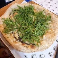 White pizza with vegan mozzarella, black truffle and rucola at Mister Pizza - Duomo in Florence