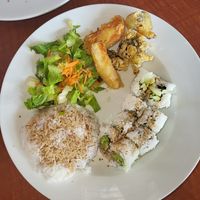 Lunch special, rice, tempura vegetables, and cucumber and avocado rolls, salad. at Blufin Sushi in Fresno