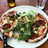 Vegan pepperoni pizza with ceasar salad at Il Fornello - Danforth Ave in Toronto