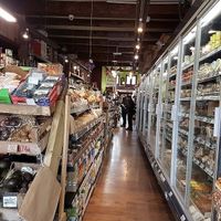 inside, narrow but long aisles at Grains & Green in East London