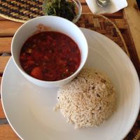 Dish of the day, spiced brown rice, with a stew of beetroot, breadfruit, carrots etc, freshly cooked with mixed greens on the side. at Mlima Sayuni Art and Vegetarian Rastaurant in Dar Es Salaam