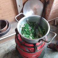 Greens being cooked at Mlima Sayuni Art and Vegetarian Rastaurant in Dar Es Salaam