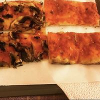 Vegan tomato with garlic & rosemary pizza and vegan tomato with mushroom pizza at Caesar Pizza in Rome