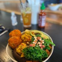 Veggie Wonderland: sweet potato hash browns, portobello mushroom with chickpeas, kale salad and avocado at Amongst Few in Dubai