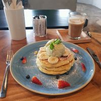 banana pancakes with dairy free ice cream  at Amongst Few in Dubai