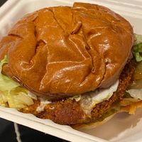 Brioche bun with faux chicken burger at Rudy's Dirty Vegan Diner in North West London