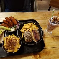 Rubens sandwich, spicy buffalo wingz, dirty fries, childhood memory shake at Rudy's Dirty Vegan Diner in North West London