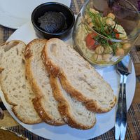 Sourdough with hummus and black olive tapenade at Remedio Santo Campo Alegre in Porto