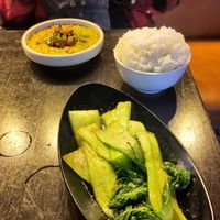 Garlic & soy greens, yellow dhal, and plain rice at Jumon in Belfast