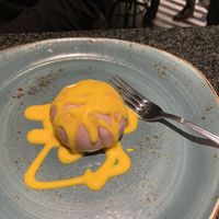 Steamed bun with taro inside and mango-vanilla sauce on it at LeDu Happy Dumplings & Noodle in Munich