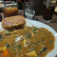Vege curry with soy bean burger, 400g rice, vegetables and spinach. at Coco Ichibanya in Hiroshima