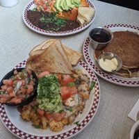 Vegan rancheros, "vegan mess" with vegan cheese, potatoes, tofu, and soyrizo. Also... Vegan pancakes! Other vegan options explicitly labeled. Yum! Best vegan breakfast I've had in  at St Francis Fountain and Candy in San Francisco