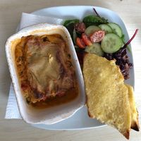The lasagne with garlic bread and some kimchi to try 😀  at Vega in Tintagel