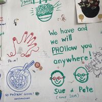 Fun wall next to my seat  at Vietnamese Coffee & Noodle Soup in Siem Reap