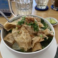 Tofu skins and tofu pieces of vegan yellow curry soup  #Veganuary at Vietnamese Coffee & Noodle Soup in Siem Reap