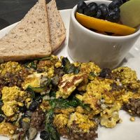 Bee-spoke scramble with v goetta, tofu scramble and added spinach, back beans and garlic herb!  at Sleepy Bee Cafe - Downtown in Cincinnati