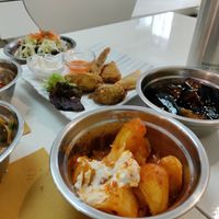 Patatas bravas, eggplant and fried bites to share at Loving Hut in Valencia