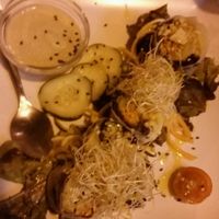 rice paper rolls with peanut coconut sauce at La Tastaolletes in Valencia