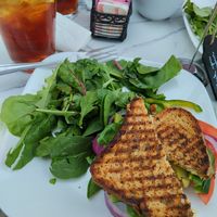 Reader panini sandwich with avocado, olive oil, tomato, greens and green peppers. Got this since most vegan options are only served till 11:30am. Make sure to ask for it vegan. at Shots Cafe in Lenox