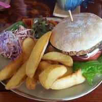 Black Bean burger, potato wedges, salad, and slaw at And 유 (Yu) Cafe in Jeju
