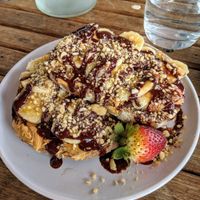 Peanut butter chocolate banana toast (ve) 😍 at Charlie's Raw Squeeze in Morningside