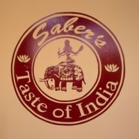 saber logo at Saber's Taste of India in Kingston